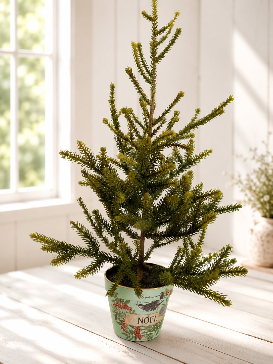 Faux evergreen in a pot