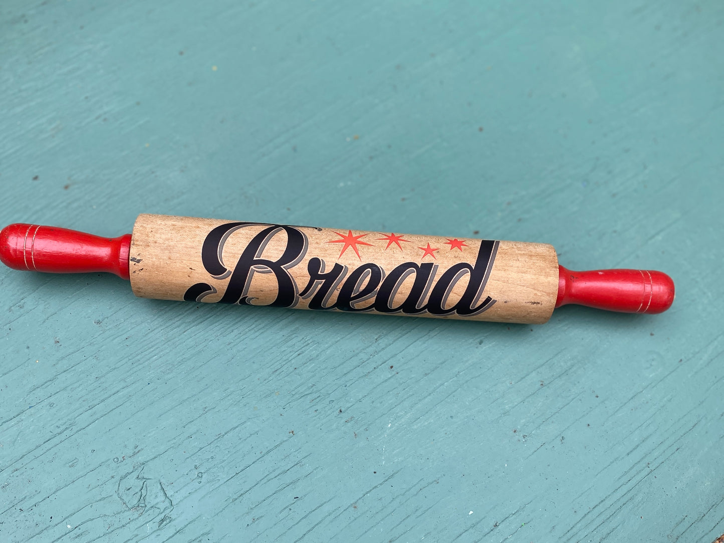 Vintage rolling pin with transfer