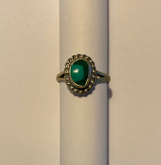 silver ring with green stone